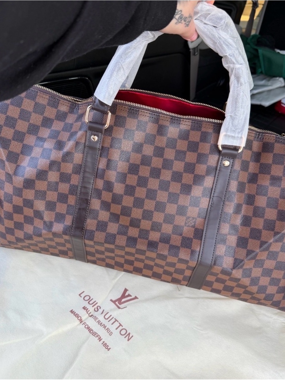 Brown checkered 55 inch duffel bag